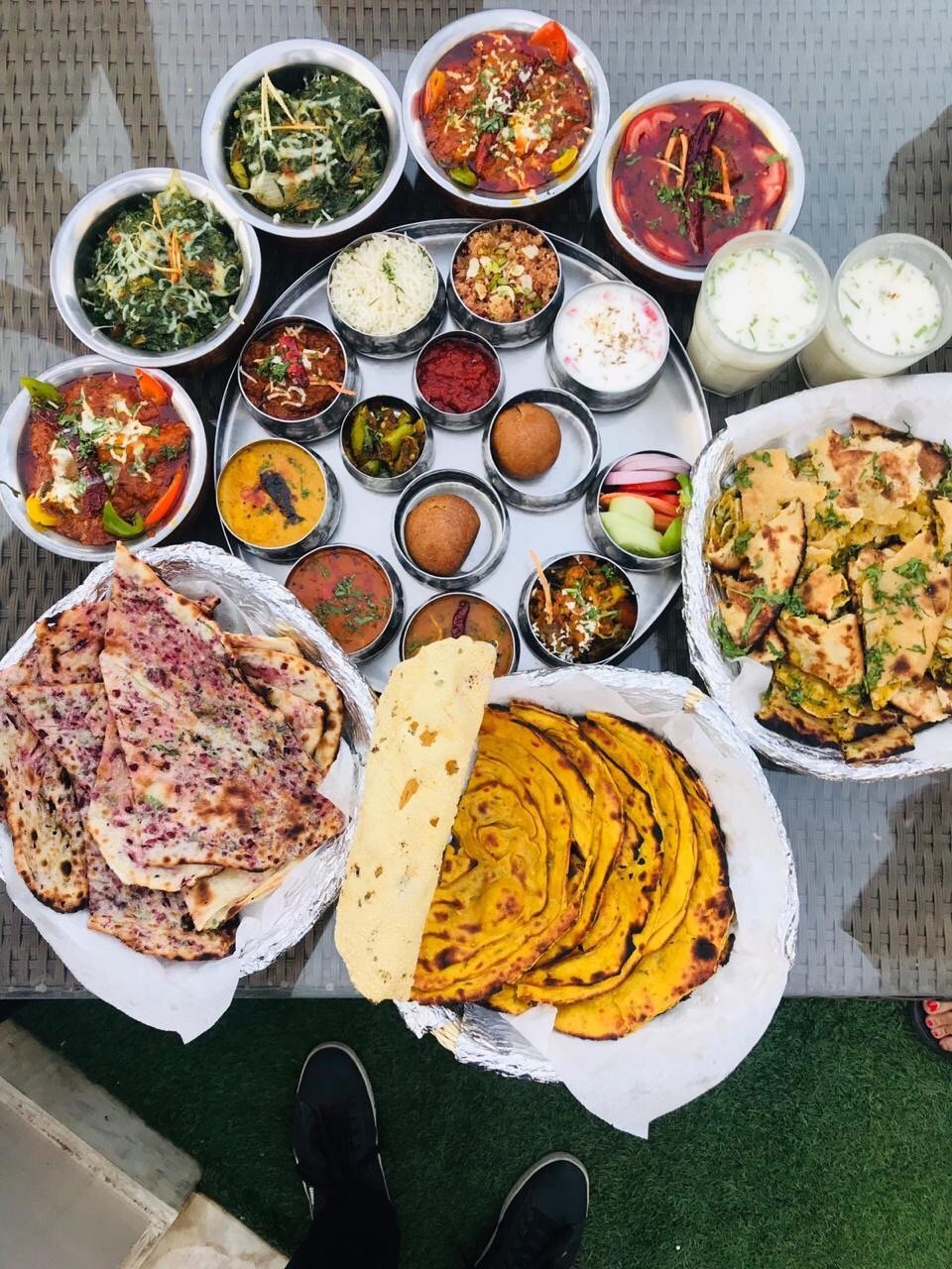 Jaipur Thali Price Govindam Retreat Rs 600 16-Item Rajasthani Thali Caption: The 16-item Rajasthani thali at Govindam Retreat — ₹600 plus GST, the best Jaipur thali price for authentic food.